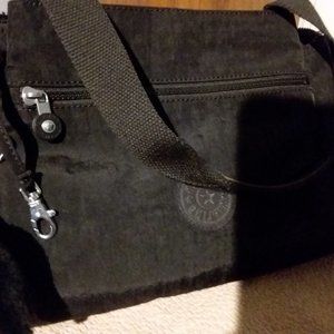 Kipling Women's Elysia Solid Convertible Crossbody Bag black monkey keychain